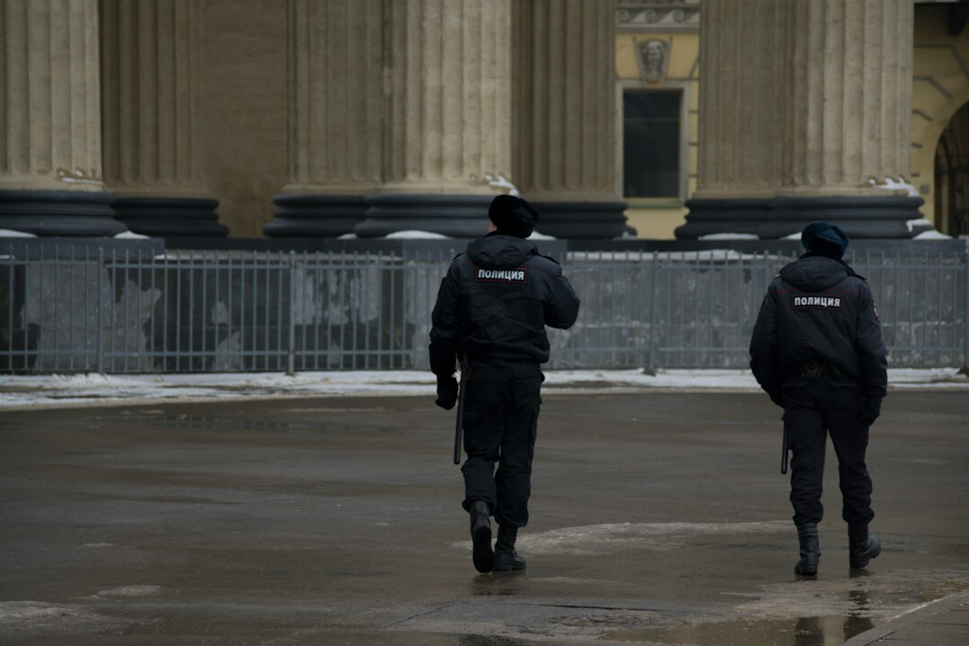 security team approaching suspect